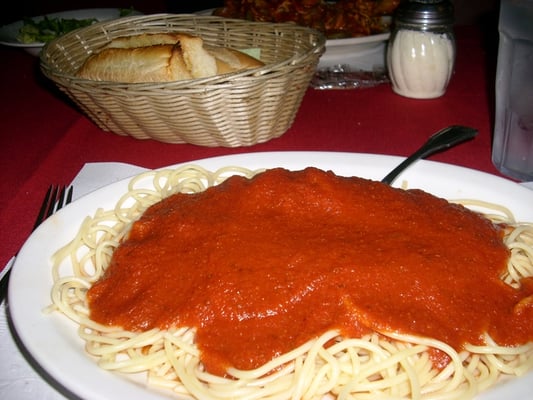 Photo of Marino's Italian Restaurant - San Diego, CA, US. spaghetti with tomato sauce, garlic bread
