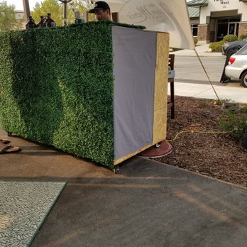 Jean Marie Cidery - a man sitting behind a box covered in grass - Cideries Near Me - Paso Robles, California Jean Marie Cidery - a man sitting behind a box covered in grass - Cideries Near Me - Paso Robles, California