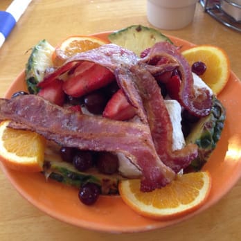 Doodles - Beignets and bacon. Huge portion. Should be shared.  Mine wasn't! - Breakfast & Brunch Near Me - Lexington, Kentucky