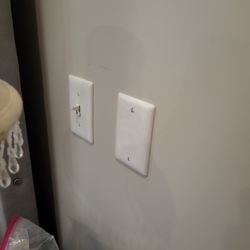 Park View Estates Assisted Living & Memory Care - THIS IS THE COVER PLATE BY THE BED WHERE THE PULL CORD OR PANIC BUTTON SHOULD BE - IT'S NOT.