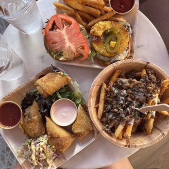 The Tropical CB - Smash burger, crab meet egg roll, bacon jalapeño eggroll and Philly fry bowl - New American Near Me - Carolina Beach, North Carolina The Tropical CB - Smash burger, crab meet egg roll, bacon jalapeño eggroll and Philly fry bowl - New American Near Me - Carolina Beach, North Carolina