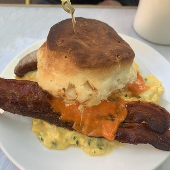 Sunflower Caffe - Buttermilk biscuit sandwich with added sausage and bacon - Coffee & Tea Near Me - Sonoma, California Sunflower Caffe - Buttermilk biscuit sandwich with added sausage and bacon - Coffee & Tea Near Me - Sonoma, California