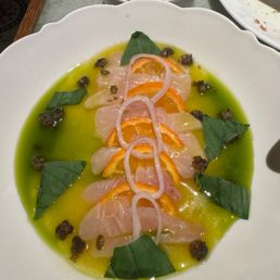 LOCAL CRUDO calamansi vinaigrette, shallots, crispy capers, seasonal citrus