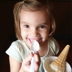 Scooped Ice Cream - Enjoying Birthday Cake ice cream in a cone/cup.