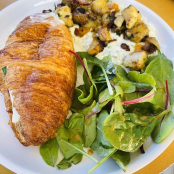 William's Coffee Co - Breakfast Croissant with egg, red onion, garden tomato, and cream cheese + roasted potatoes with dill yogurt sauce, and fresh greens - Coffee & Tea Near Me - Phoenix, Arizona