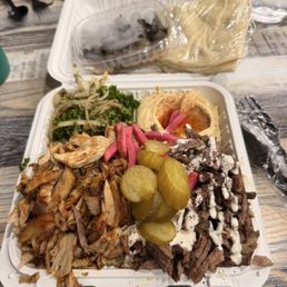 Half and half shawarma combo plate with hummus and salad. Half/Half shawarma Half and half shawarma combo plate with hummus and salad. Half/Half shawarma