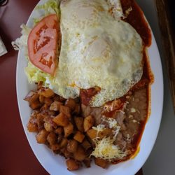 Speedy's Mexican Food - Red enchiladas montadas with egg over easy cooked to perfection