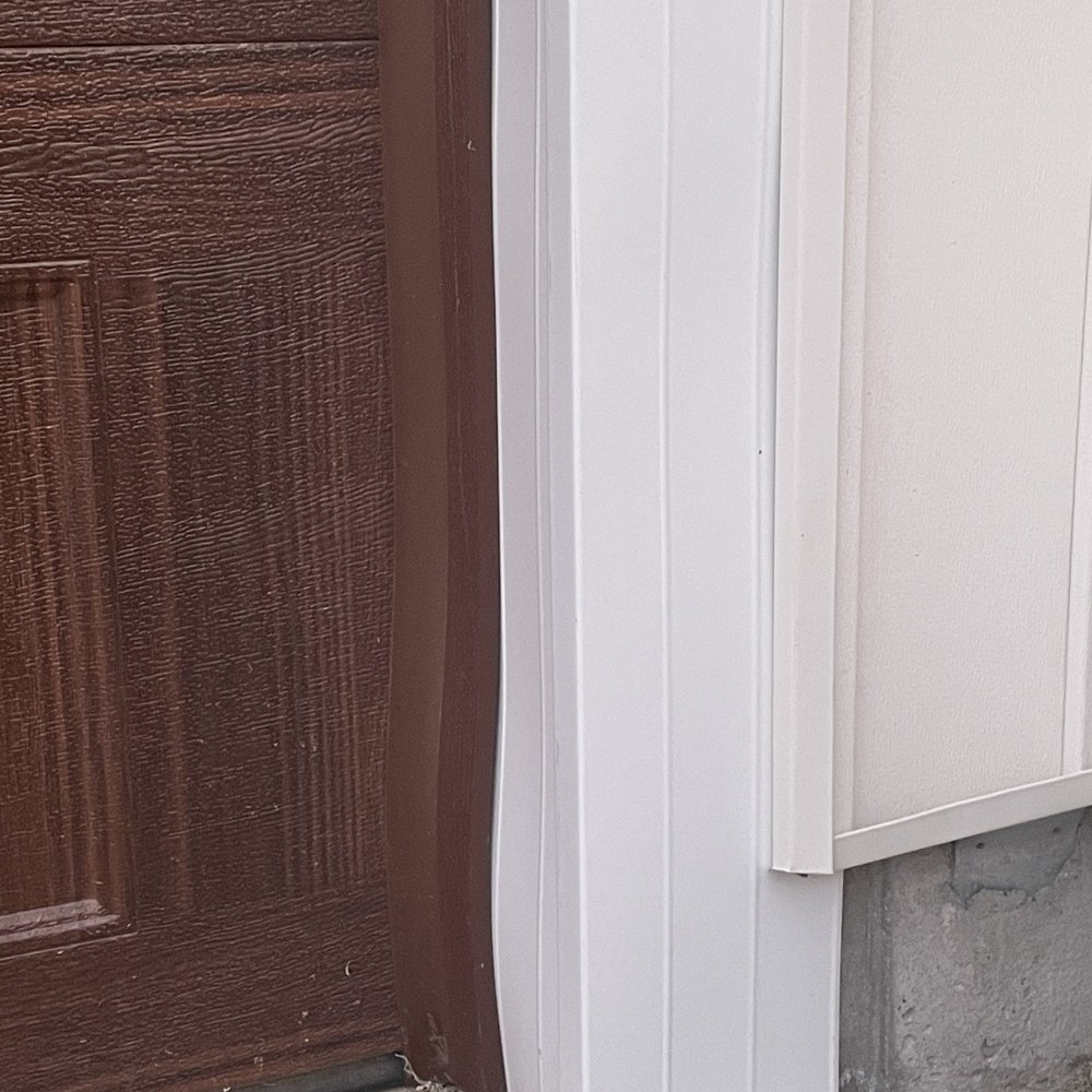 Duke Building - Warped siding effecting the garage door strip as well. - General Contractors Near Me - Logan, Utah Duke Building - Warped siding effecting the garage door strip as well. - General Contractors Near Me - Logan, Utah