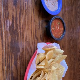 Greeted with chips, hot sauce, & beans! Greeted with chips, hot sauce, & beans!