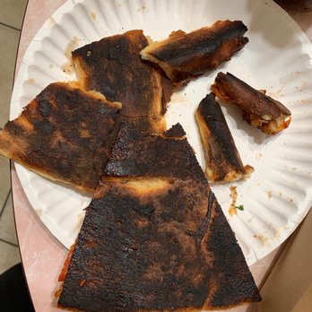 Dimo's Pizza - Ordered a pepperoni slice and it was super burnt tasted even sour or how burnt the crust!! - Pizza Near Me - Chicago, Illinois