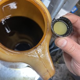 The old fluid is the the yellow container and I was told that the new should look like this. The old fluid is the the yellow container and I was told that the new should look like this.