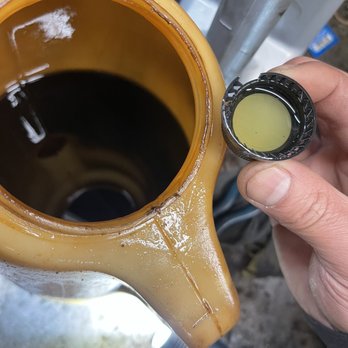 Ngai's Auto Repair - The old fluid is the the yellow container and I was told that the new should look like this. - Auto Repair Near Me - San Francisco, California Ngai's Auto Repair - The old fluid is the the yellow container and I was told that the new should look like this. - Auto Repair Near Me - San Francisco, California