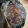 Photo of Teal Tiger Tattoo