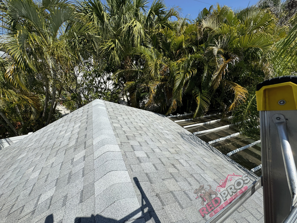 Slide of Red Pros Roofing