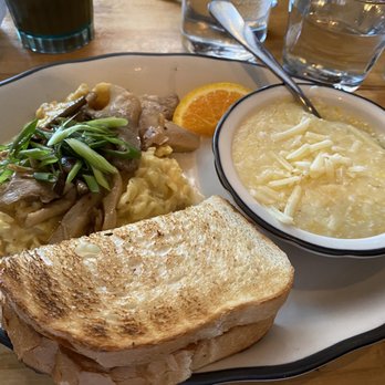 Hot Suppa - Mushroom scramble with local Maine mushrooms cooked in a miso butter, alongside grits with cheese added & toast - Breakfast & Brunch Near Me - Portland, Maine