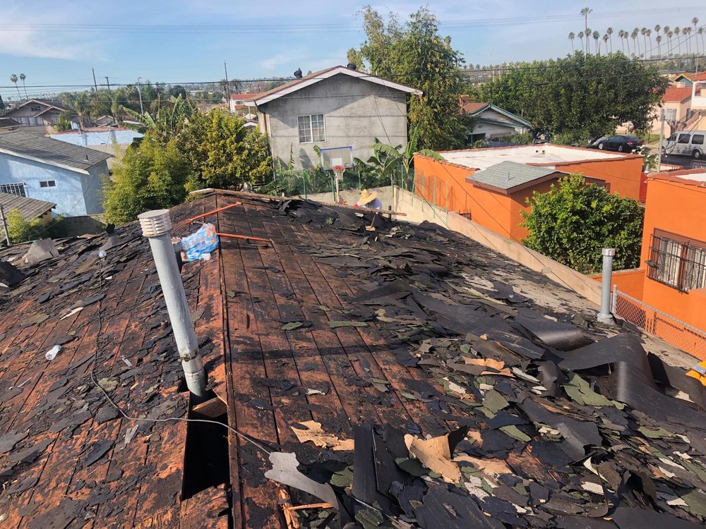 Slide of HUS Roofing