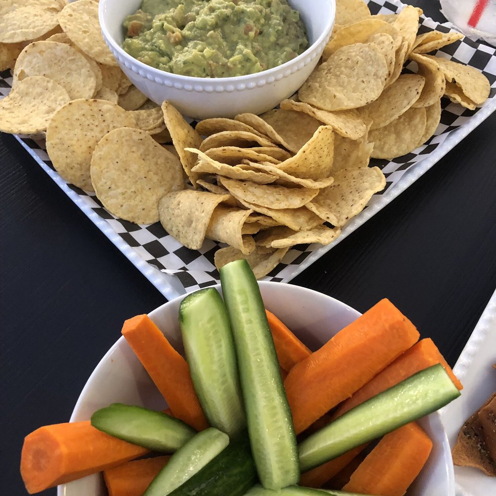 The Atmosphere - Guacamole and Chips (ordered a side of veggies for a healthy dipping option) - Mediterranean Near Me - Glendale, California The Atmosphere - Guacamole and Chips (ordered a side of veggies for a healthy dipping option) - Mediterranean Near Me - Glendale, California