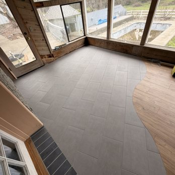 Connolly Tile - Large format porcelain. "Wavy" transition - Tiling Near Me Connolly Tile - Large format porcelain. "Wavy" transition - Tiling Near Me