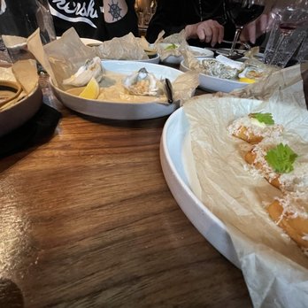 Opal - Array of different snacks (Chickpea Panisse) - New American Near Me - Washington, DC, District of Columbia
