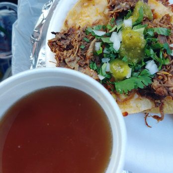 El Llanerito Birrieria - Queso Taco Chivo (Goat) w/ Consome Super good.  Topped with cilantro onion and some spicy green salsa - Food Trucks Near Me - Visalia, California