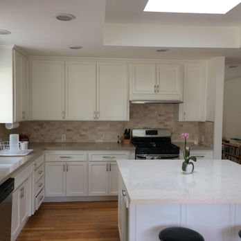 DMD Construction - Newly painted cabinets, new doors, center island, backsplash, and counters. - General Contractors Near Me DMD Construction - Newly painted cabinets, new doors, center island, backsplash, and counters. - General Contractors Near Me