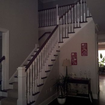LJ Trimworks - a staircase in a home - General Contractors Near Me