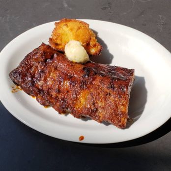 Conner's Kitchen + Bar - Hickory smoked baby back ribs( half rack sweet & spicy sauce, honey butter cornbread). - Breakfast & Brunch Near Me - Indianapolis, Indiana Conner's Kitchen + Bar - Hickory smoked baby back ribs( half rack sweet & spicy sauce, honey butter cornbread). - Breakfast & Brunch Near Me - Indianapolis, Indiana
