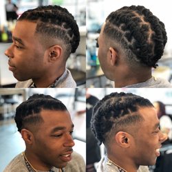 Emerald City Barber - Who says you can't have short & long hair! A nice tapered cut helps to define any style.  Cut by Jeremy