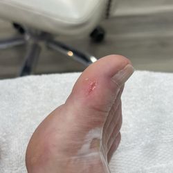 Diamond Nails - The woman doing my pedicure was very rough.  She scrubbed my foot so hard and long in the same spot that she cut my toe.