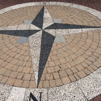 L Hernandez Landscaping - a compass rose on a brick floor - Landscaping Near Me - Ingleside, Illinois L Hernandez Landscaping - a compass rose on a brick floor - Landscaping Near Me - Ingleside, Illinois
