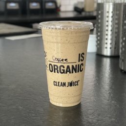 a cup of organic clean juice