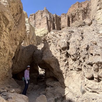 Golden Canyon - Nearing the end toward Red Cathedral, you duck through this arch - Active Life Near Me - Death Valley Junction, California Golden Canyon - Nearing the end toward Red Cathedral, you duck through this arch - Active Life Near Me - Death Valley Junction, California