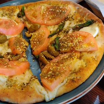 Paramount Middle Eastern Kitchen - Tomato halloumi pizza - Middle Eastern Near Me - Toronto, Ontario