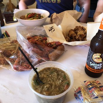 LA Crawfish - Sea food Gumbo in front a pound of crawfish on the left buffalo wings on the right, and way in the back was the awesome garlic noodles. - Vietnamese Near Me - San Antonio, Texas LA Crawfish - Sea food Gumbo in front a pound of crawfish on the left buffalo wings on the right, and way in the back was the awesome garlic noodles. - Vietnamese Near Me - San Antonio, Texas