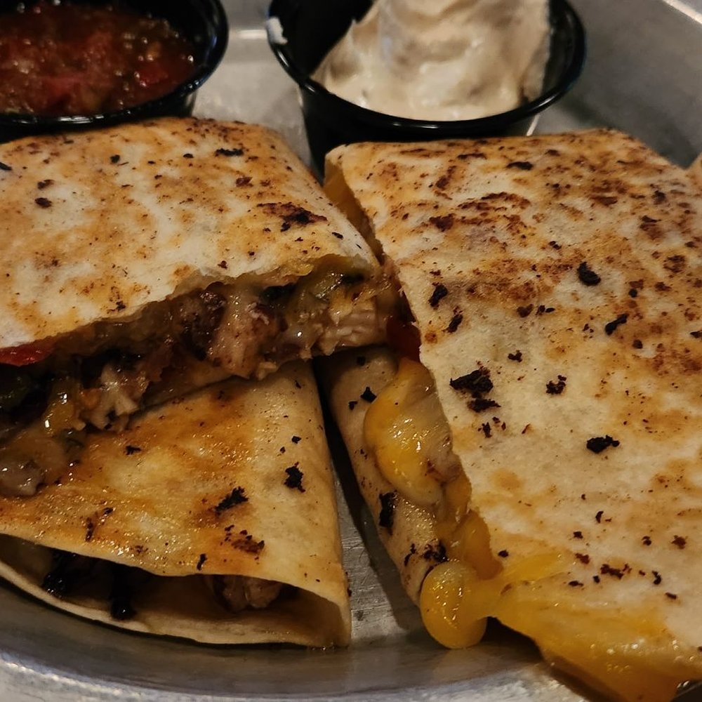 R P Tracks - Jerk chicken quessadilla! - American Near Me - Memphis, Tennessee R P Tracks - Jerk chicken quessadilla! - American Near Me - Memphis, Tennessee