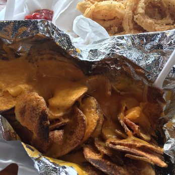 Harvey B's - Cheddar spiral fries and hand-battered onion rings. - Burgers Near Me - Dallas, Texas