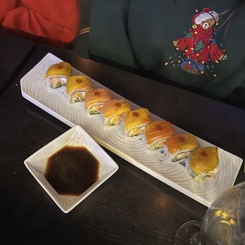Cafe Icon Sushi and Grill - Think this was a special roll.. it had mango on it - Sushi Bars Near Me - Edmond, Oklahoma