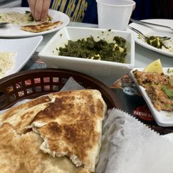 Palak paneer, chicken seekh kabob, and parathan naan and jeera rice