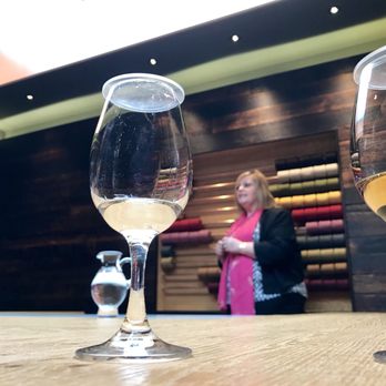 Isle of Harris Distillery - New make spirit on the left and a blended whisky on the right, inside the distillery's tasting room. - Distilleries Near Me - Tarbert, ELS