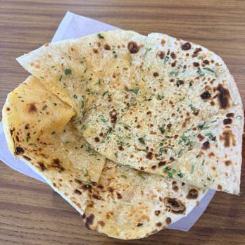 Kripa Indian Cuisine - Garlic Cheese Naan - Indian Near Me - Enid, Oklahoma Kripa Indian Cuisine - Garlic Cheese Naan - Indian Near Me - Enid, Oklahoma
