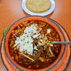 Pueblito Lindo - Pozole topped with cabbage and onion