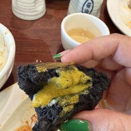 Charcoal bun with egg yolk Charcoal bun with egg yolk