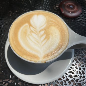 Melo Coffee & Kitchen - Hazelnut latte with oatmilk. Lovely latte art and quite tasty. - Cafes Near Me - Rochester, New York Melo Coffee & Kitchen - Hazelnut latte with oatmilk. Lovely latte art and quite tasty. - Cafes Near Me - Rochester, New York