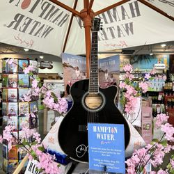 Bubbles Liquor World - Jon Bon Jovi signed guitar raffle