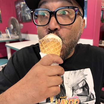 Seaside Scoops - a man eating an ice cream cone - Desserts Near Me - White Rock, British Columbia