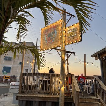 The Surfing Pig - a sign for the restaurant - Seafood Near Me - North Wildwood, New Jersey The Surfing Pig - a sign for the restaurant - Seafood Near Me - North Wildwood, New Jersey