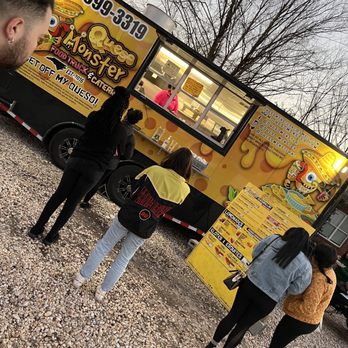 Queso Monster - a group of people standing in front of a food truck - Food Trucks Near Me - Durham, North Carolina Queso Monster - a group of people standing in front of a food truck - Food Trucks Near Me - Durham, North Carolina