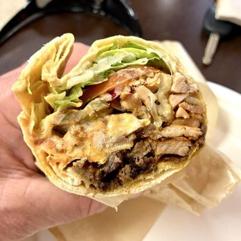 Ikram Grill - #1 - Mixed Doner Wrap with chicken and beef ($14.29). Delicious!! Be sure to add the hot sauce and spicy pickles. - Turkish Near Me - Fountain Valley, California Ikram Grill - #1 - Mixed Doner Wrap with chicken and beef ($14.29). Delicious!! Be sure to add the hot sauce and spicy pickles. - Turkish Near Me - Fountain Valley, California