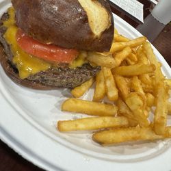 Ricky Dean’s - Burger and fries on pretzel bun