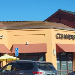 Empire Dry Cleaners - Front of store, looks like an abandoned store